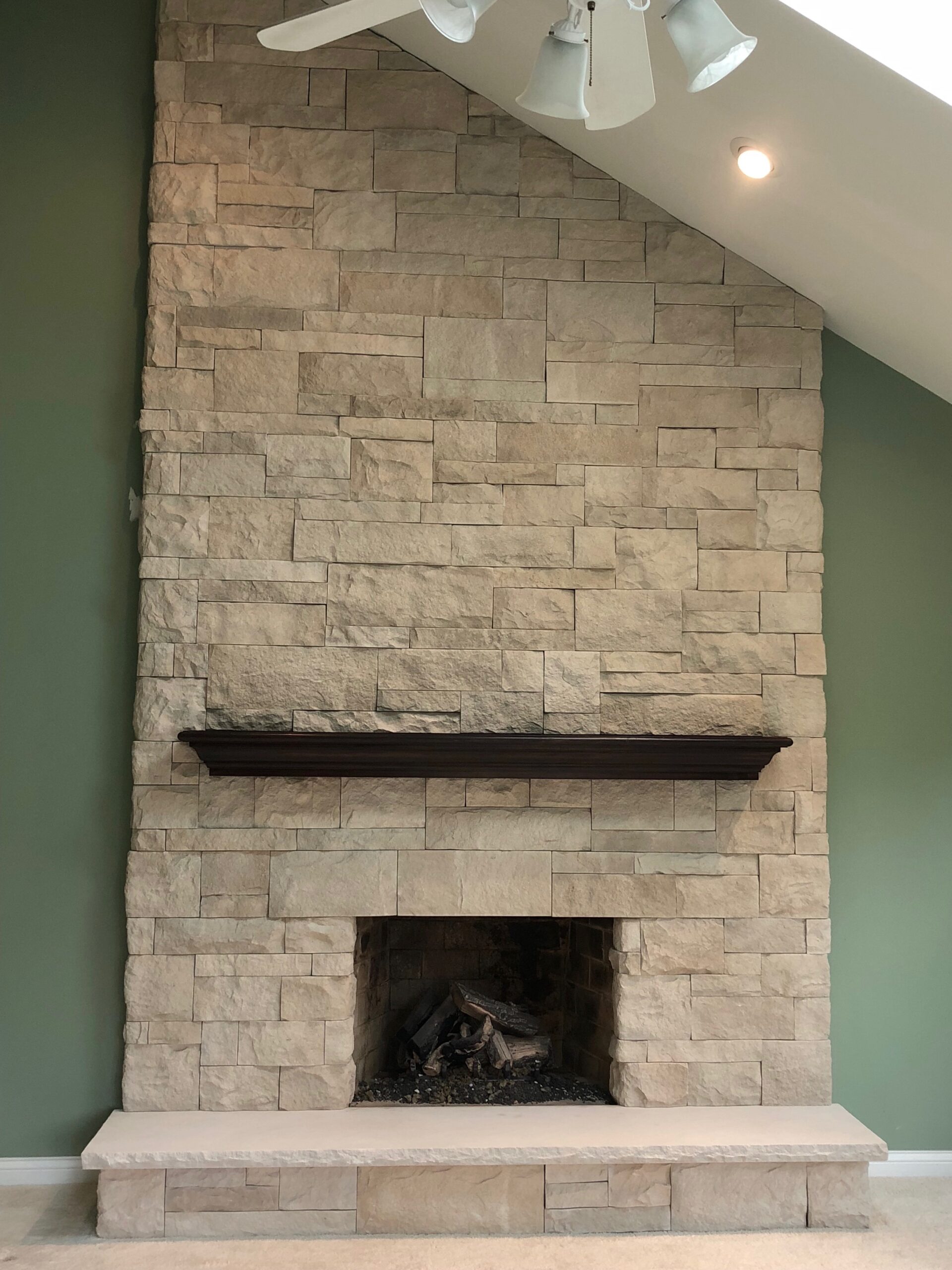 stone veneer fireplace renovation