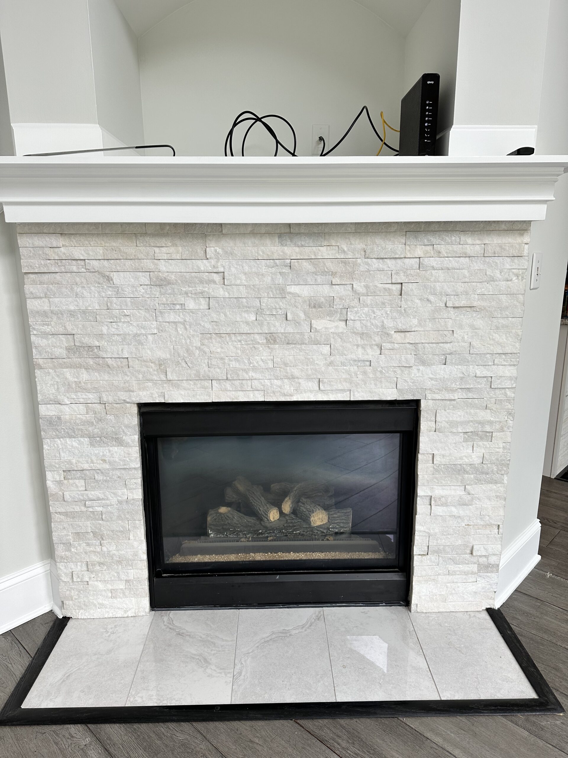 modern natural stone veneer panel fireplace